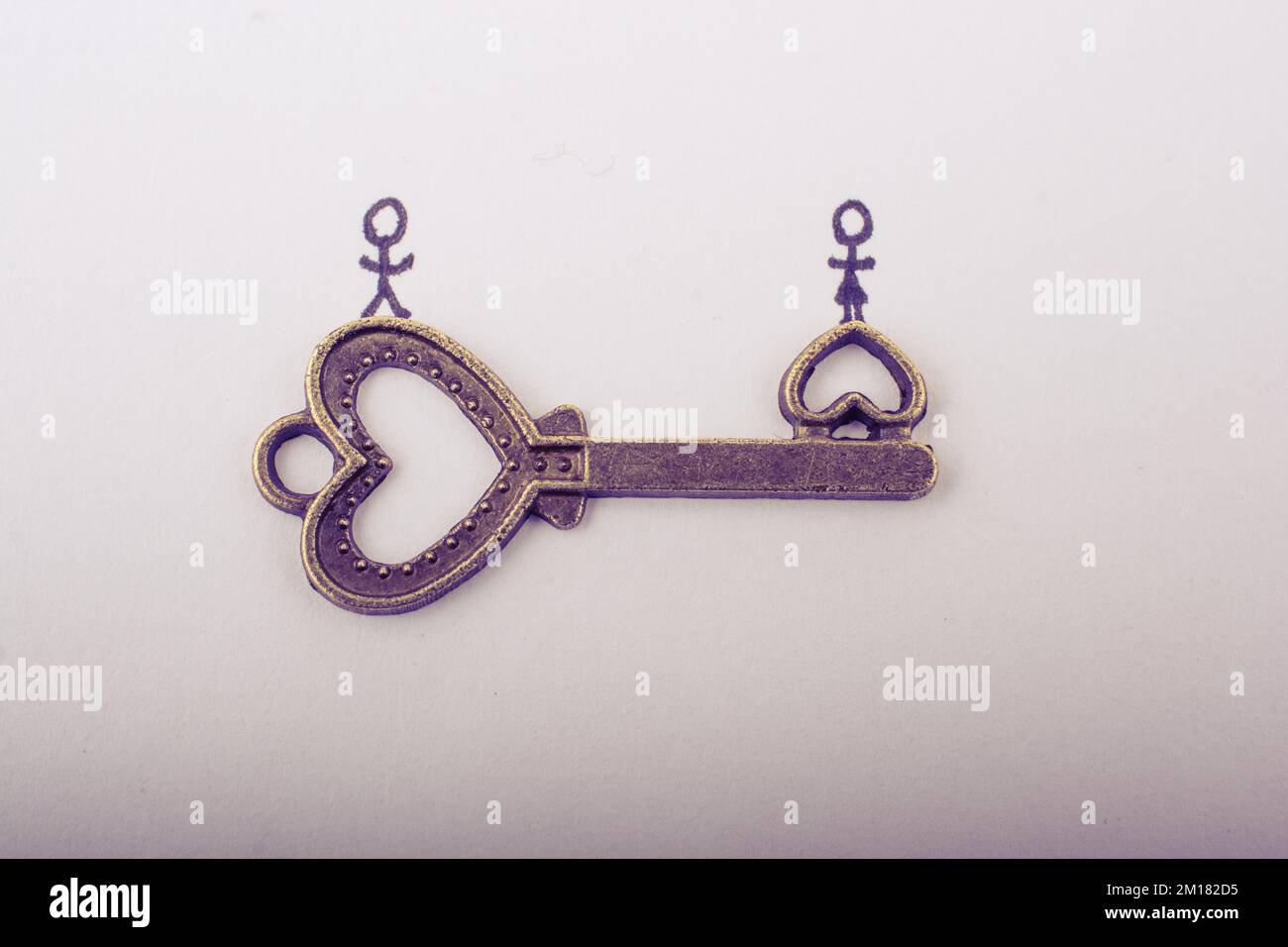 Stick man, woman and heart shaped key on white background Stock Photo ...