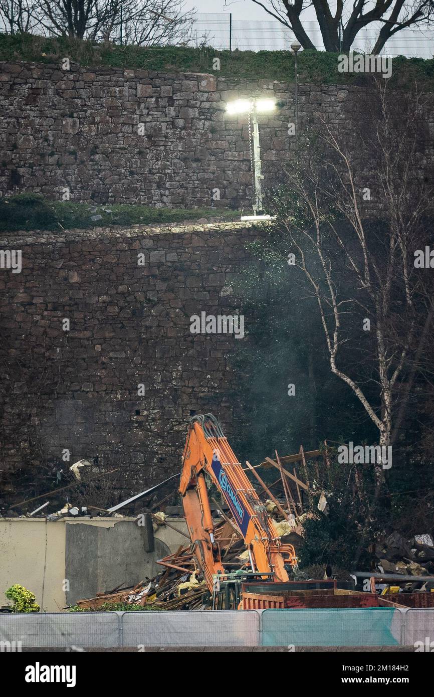 The scene of an explosion and fire at a block of flats in St Helier