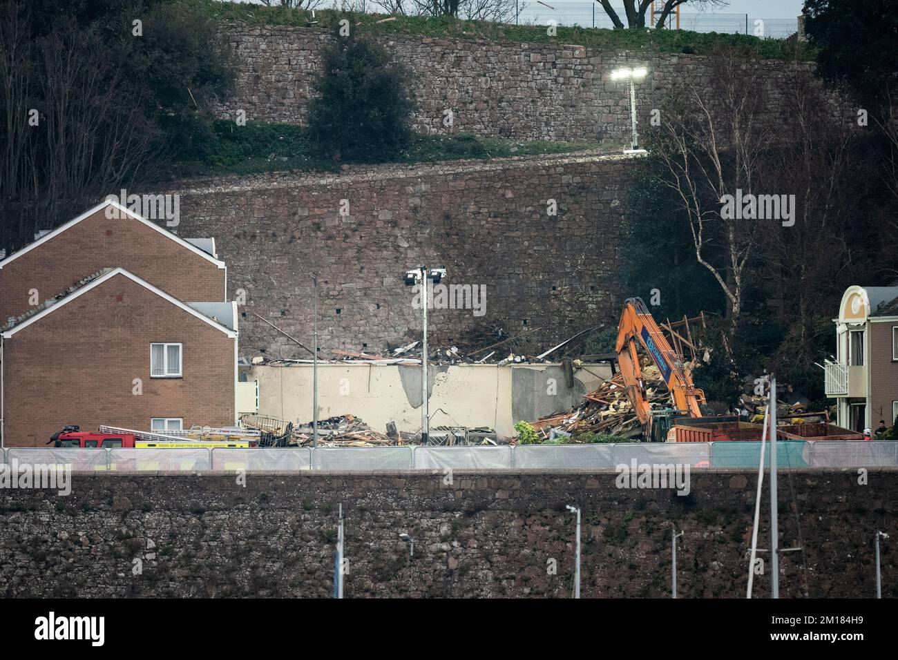 The scene of an explosion and fire at a block of flats in St Helier