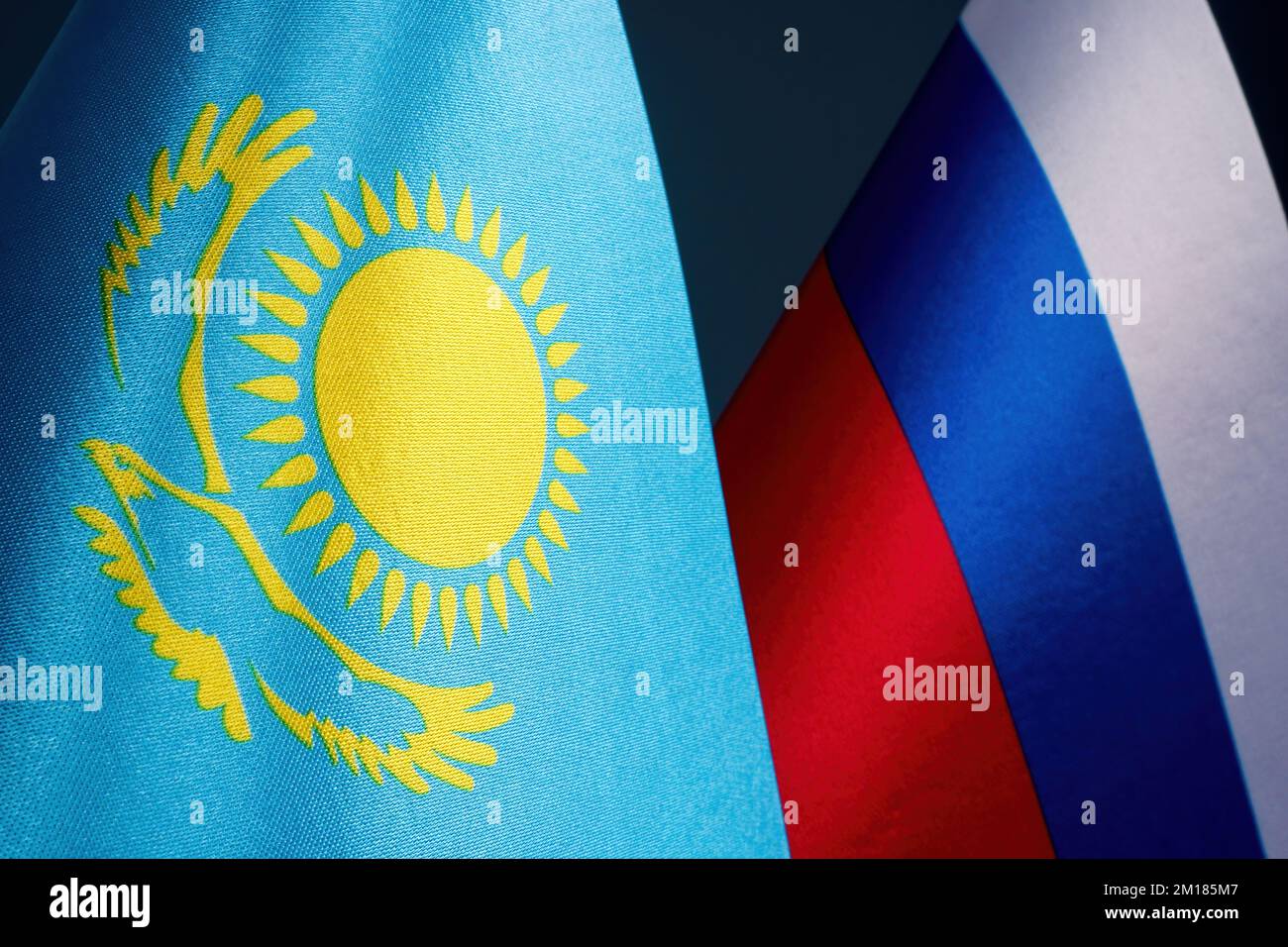 Flags of Kazakhstan and Russia as a concept of interstate relations. Stock Photo