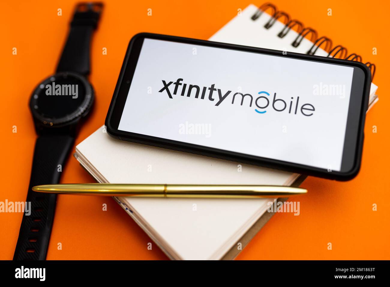 In this photo illustration a Xfinity Mobile logo seen displayed on a smartphone. (Photo by Mateusz Slodkowski / SOPA Images/Sipa USA) Stock Photo