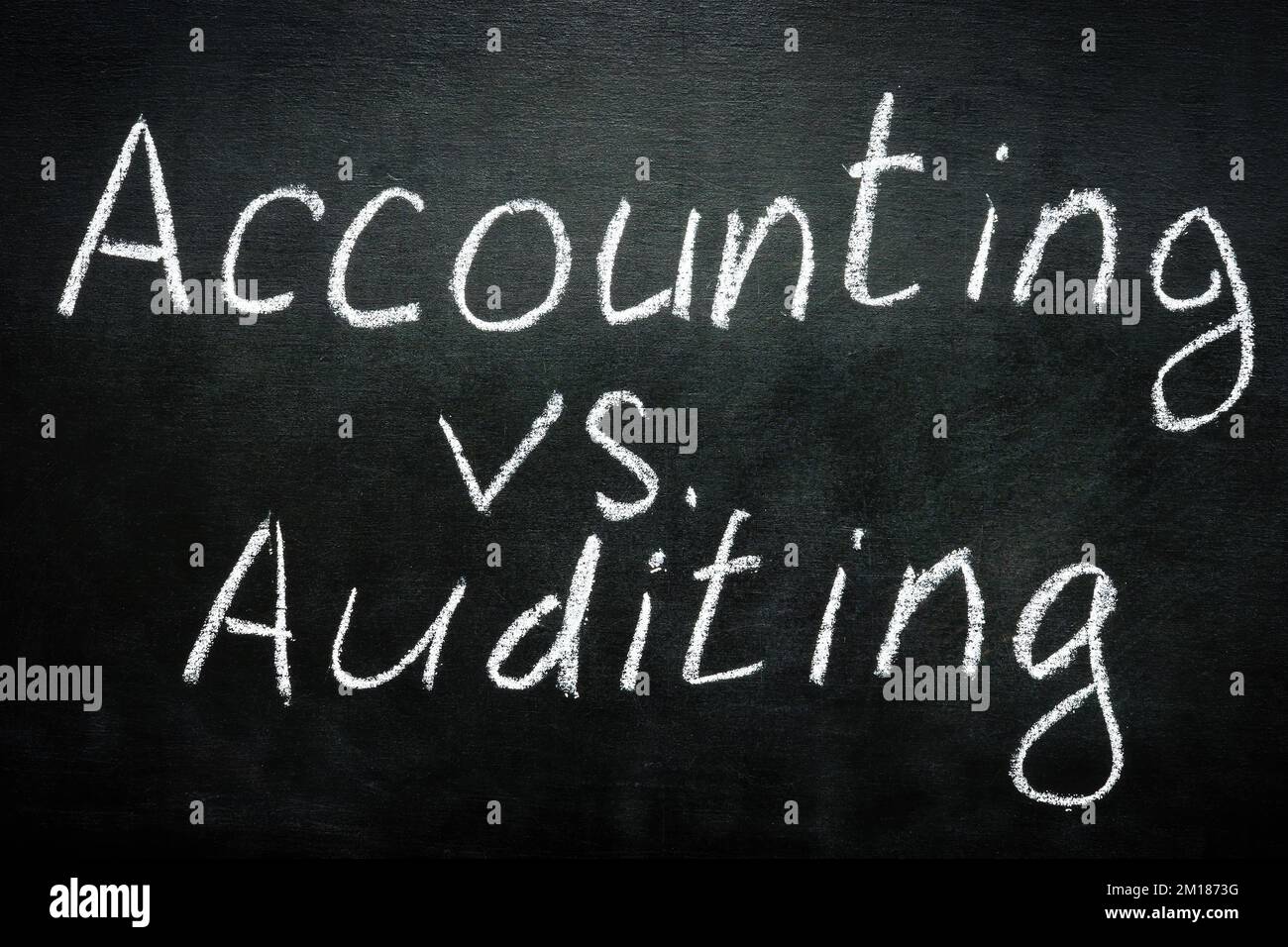 Accounting vs auditing inscription is written in chalk Stock Photo Alamy