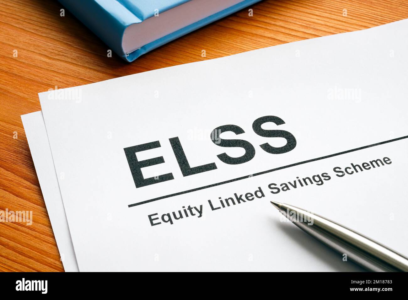 Papers about ELSS or equity-linked savings scheme. Stock Photo