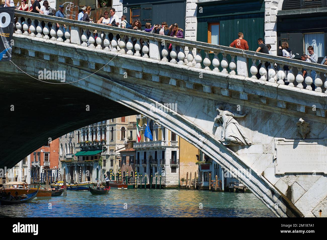 Young people in Rialto Bridge, Venice Stock Photo