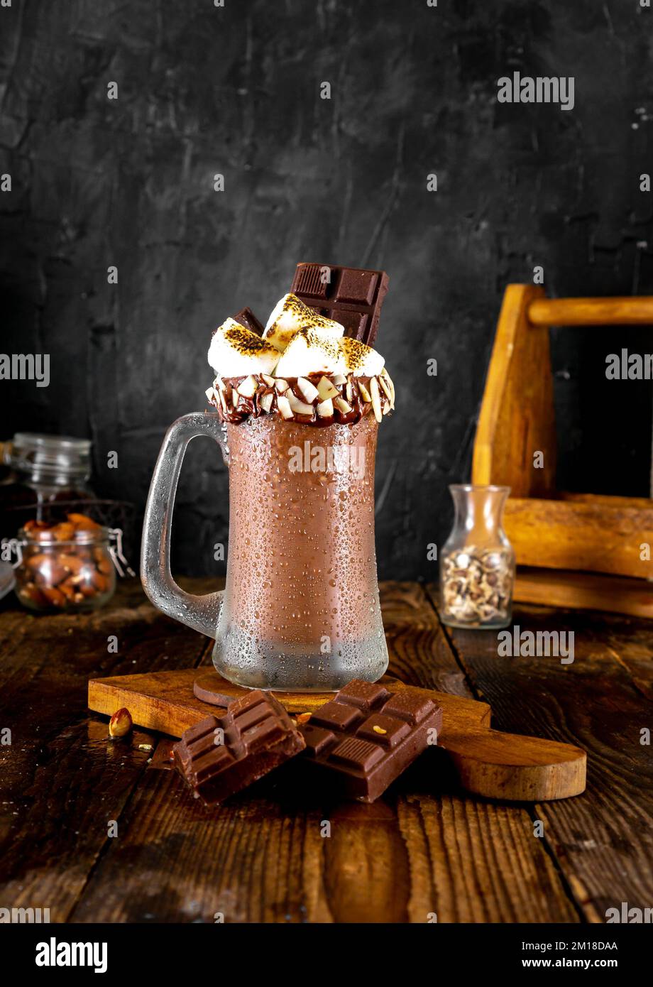 Ice Chocolate with Toasted Marshmallow drink in dark background. Stock Photo