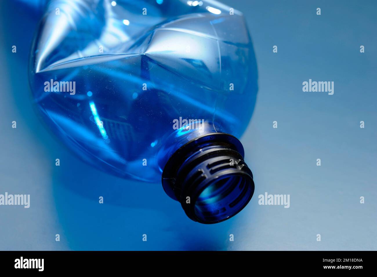 empty blue plastic bottle, recycling concept Stock Photo