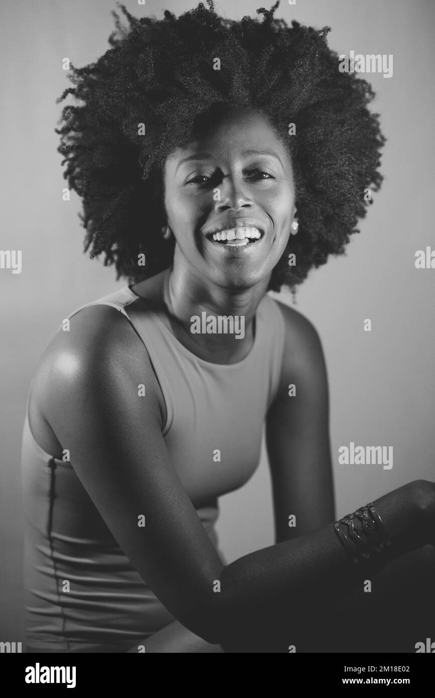 Happy white female curly Black and White Stock Photos & Images - Alamy