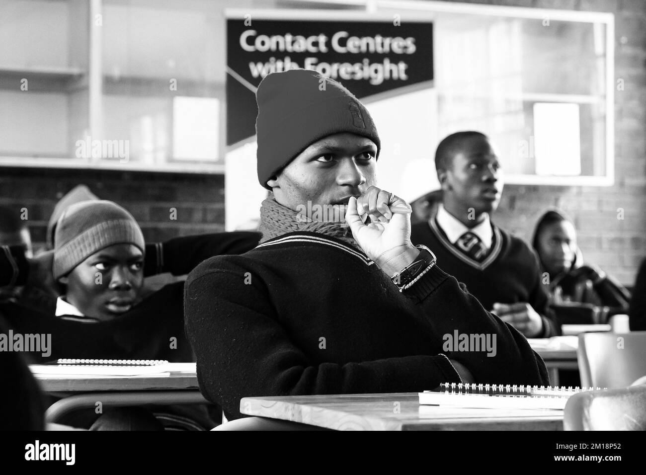 A grayscale shot of African high school pupils in classroom Stock Photo ...