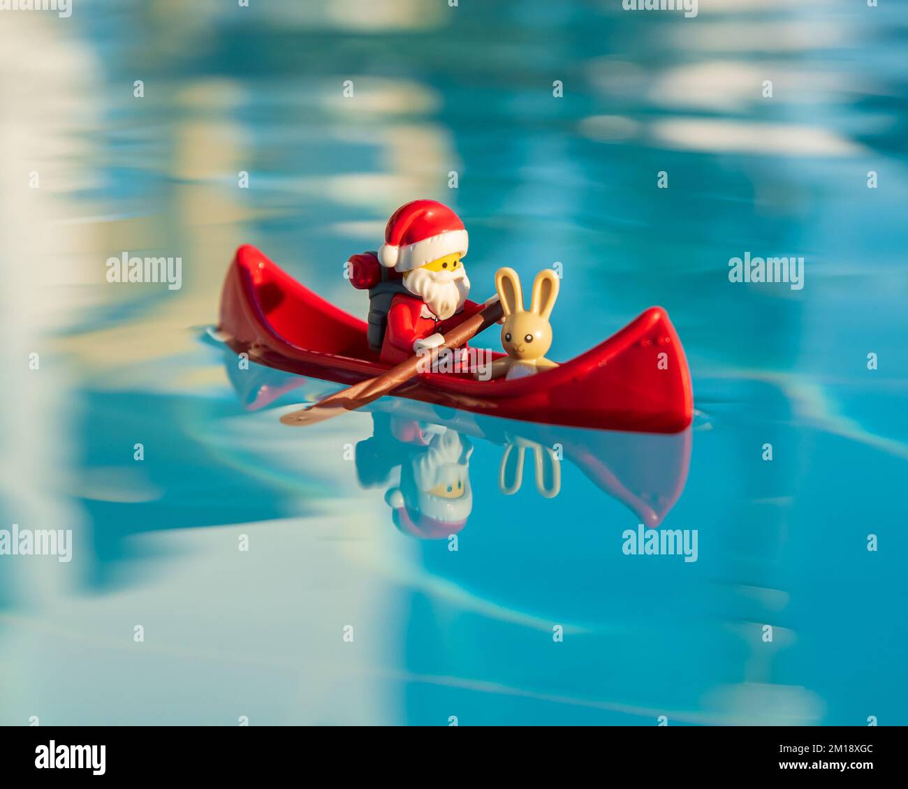 Lego minifigure Santa clause on vacation Stock Photo