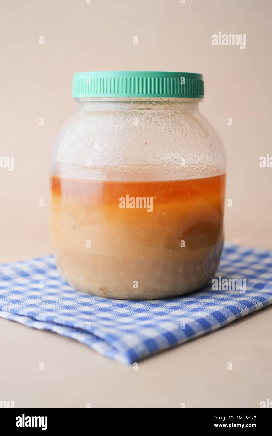 homemade ghee in container on a table Stock Photo Alamy