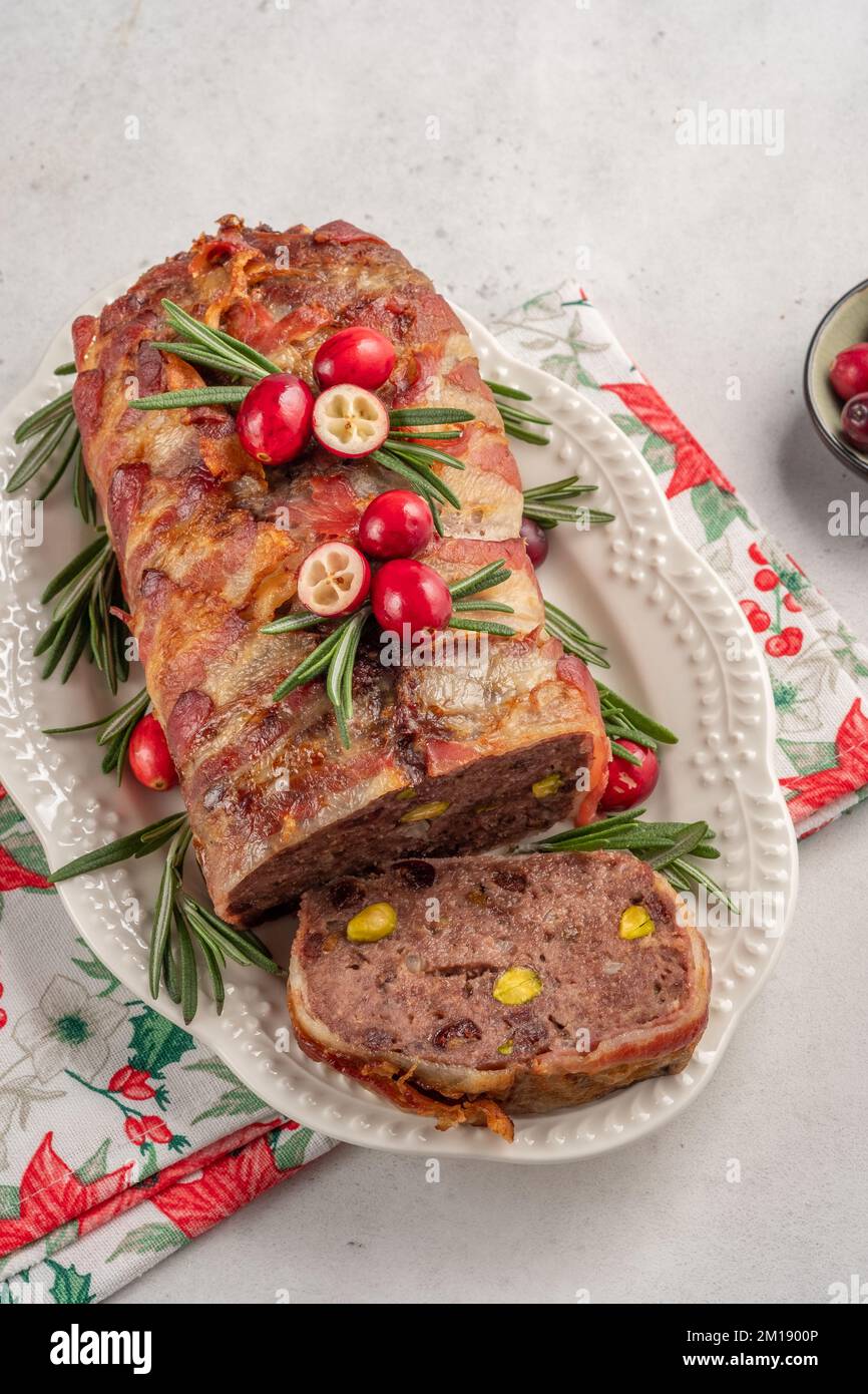 Terrine of pork with pistachios, cherries, chicken and bacon Stock