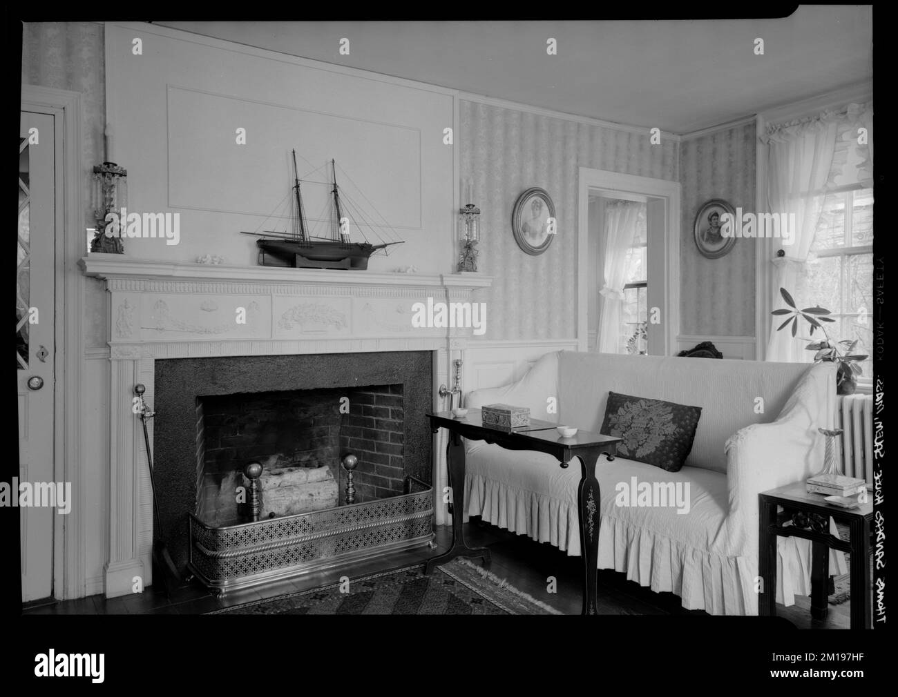 Thomas Sanders House, fireplace - sofa, Salem, MA, interior , Rooms & spaces, Fireplaces. Samuel Chamberlain Photograph Negatives Collection Stock Photo
