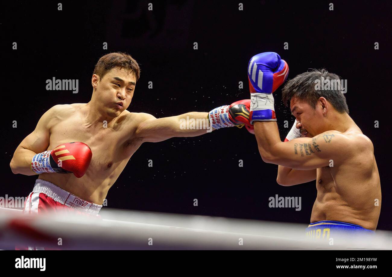 Goyang, South Korea. 11th Dec, 2022. Former Filipino boxer Emmanuel Dapidran Pacquiao Sr. (R) fights against South Korean martial artist D.K