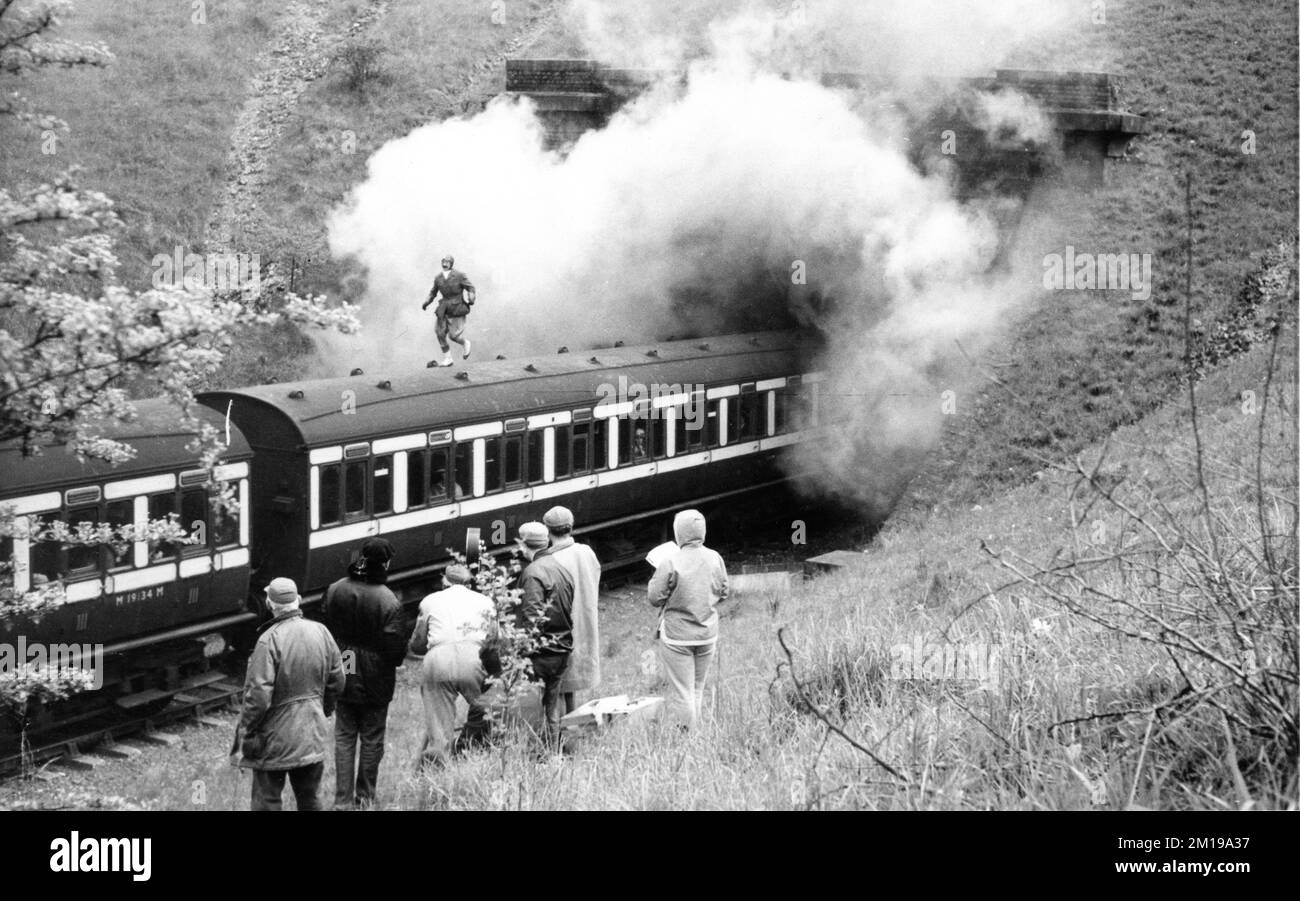 Movie / Film Crew during location filming in England of Train Sequence featuring the Stunt Double for TERRY-THOMAS for THOSE MAGNIFICENT MEN IN THEIR FLYING MACHINES 1965 director KEN ANNAKIN music Ron Goodwin costume design Osbert Lancaster Twentieth Century Fox Productions Stock Photo