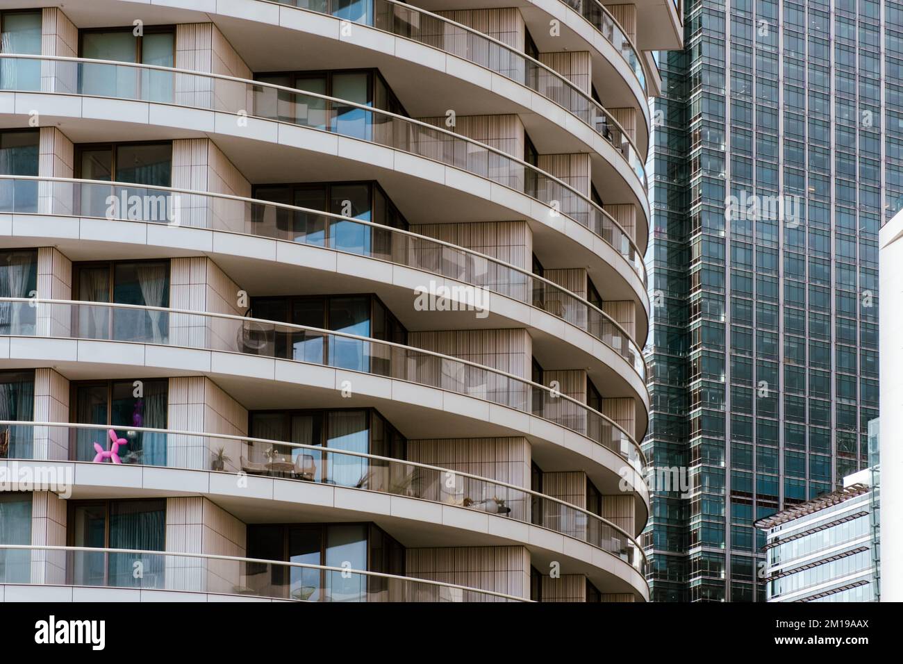 Detail of high-rise residential & commercial buildings including One Park Drive. Curved balconies. Canary Wharf, London, England. Stock Photo