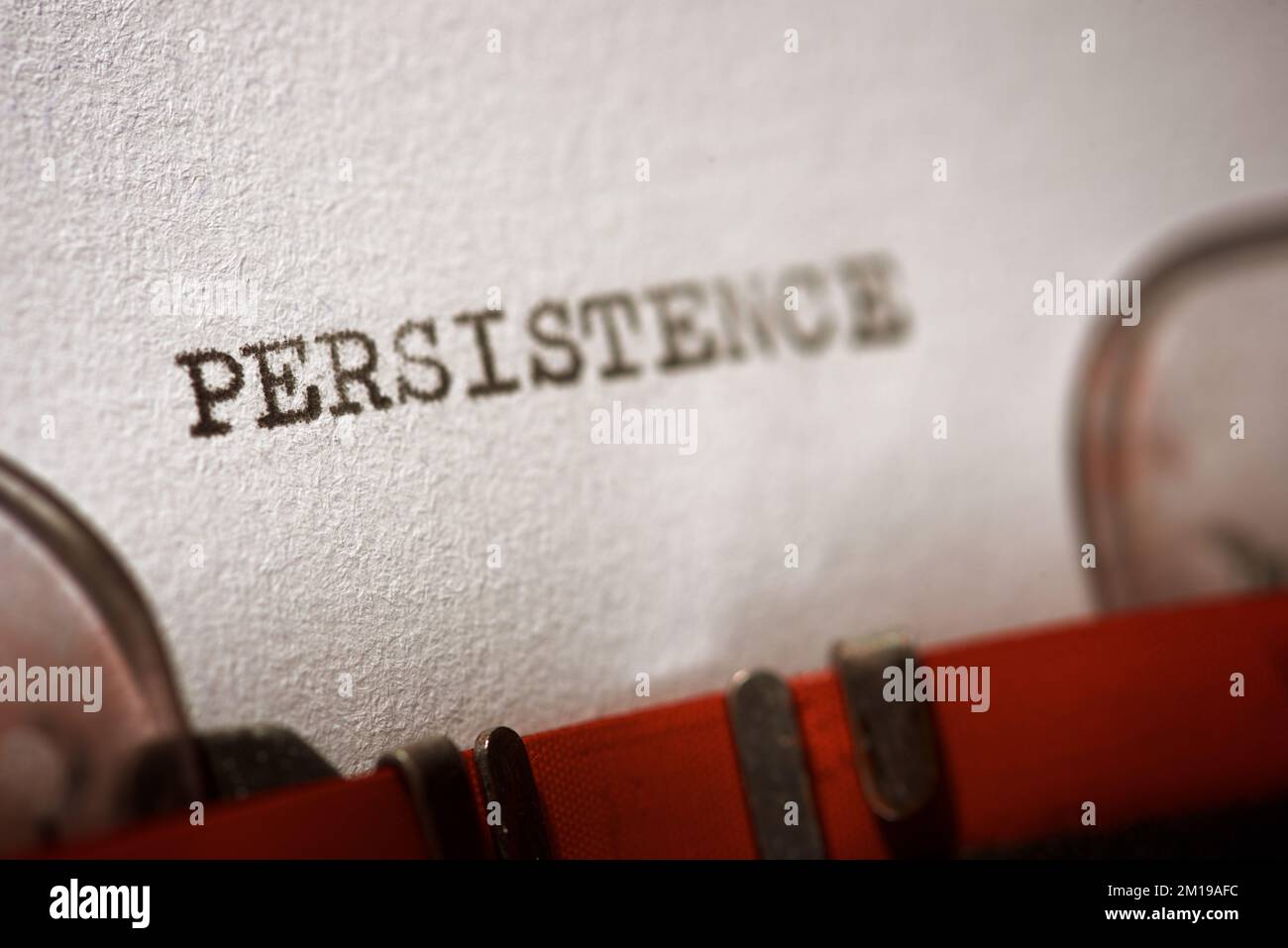 Persistence word written with a typewriter. Stock Photo