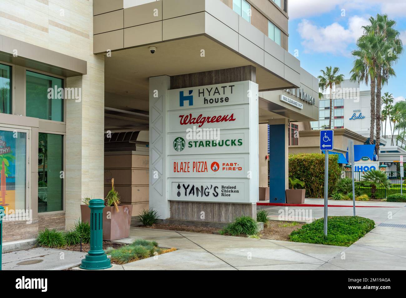 Anaheim, CA, USA – November 1, 2022: A multi-tenant sign at street level on a building on Harbor Blvd in Anaheim, California. Stock Photo