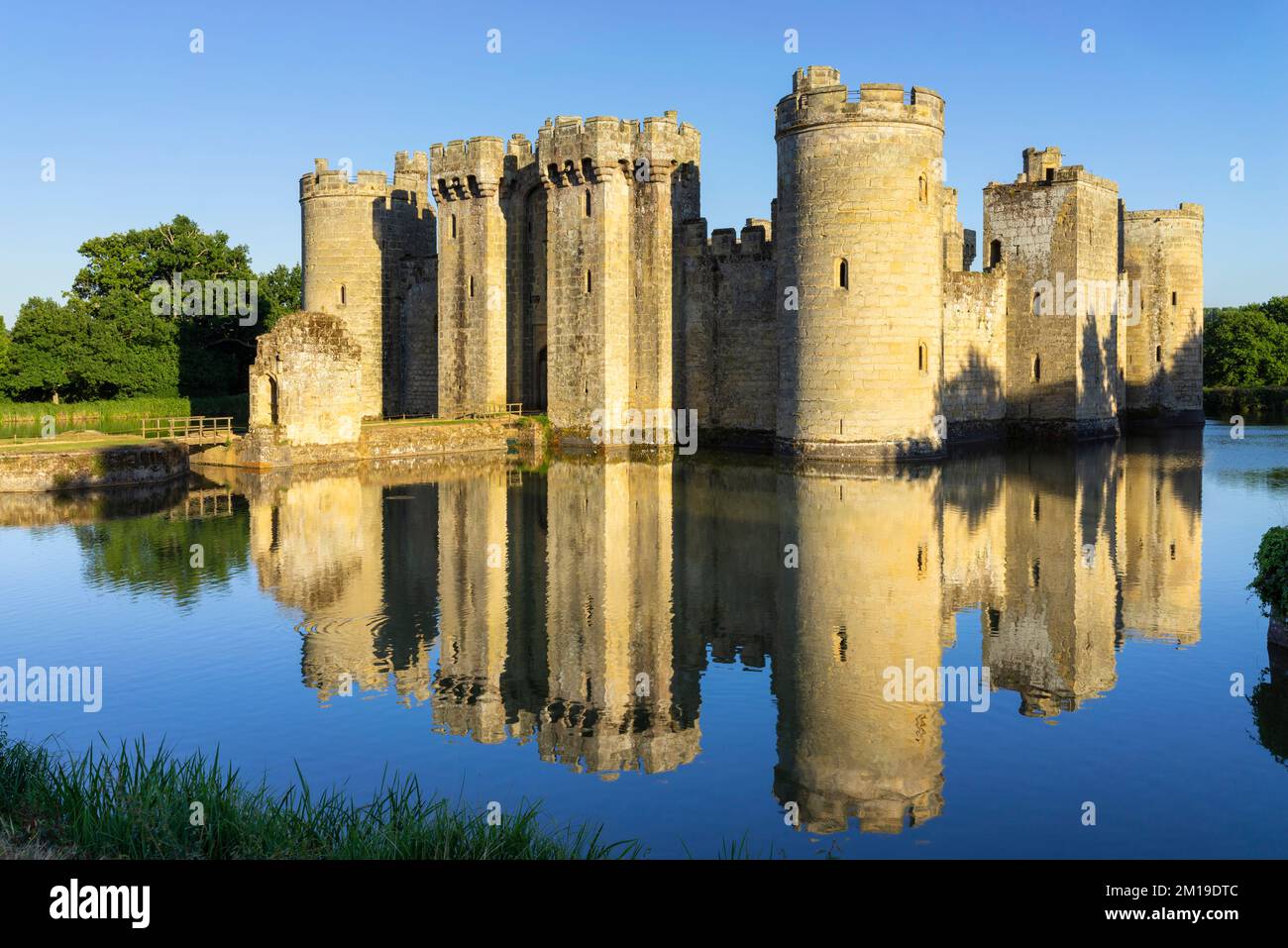 Bodiam Castle with perfect reflection in the moat - Bodiam Castle 14th-century moated castle Robertsbridge Bodiam East Sussex England UK GB Europe Stock Photo