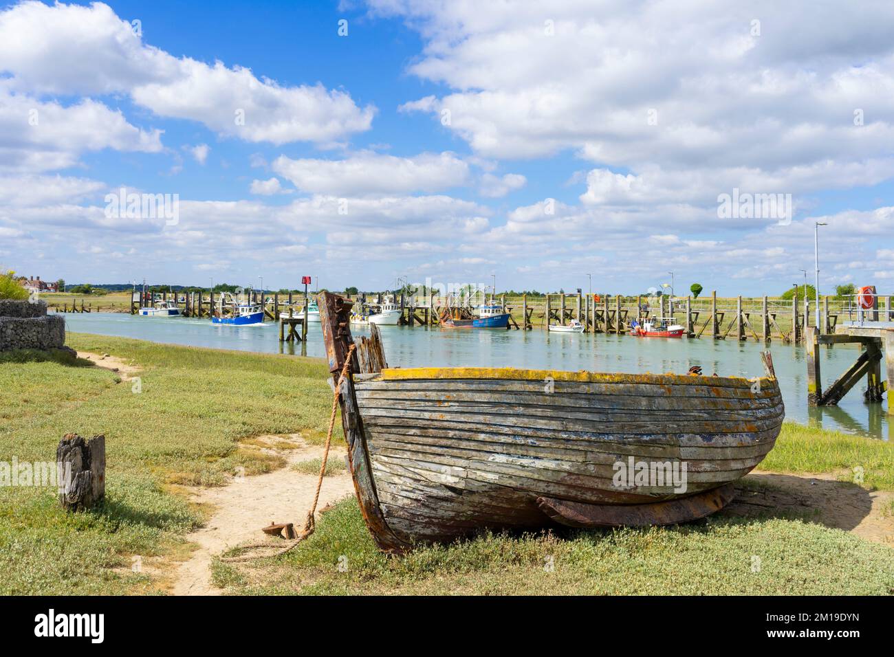 Rye harbour Old fishing boat moored on the Intertidal river banks of the River Rother at Rye Harbour village old boat Rye Sussex England UK GB Europe Stock Photo