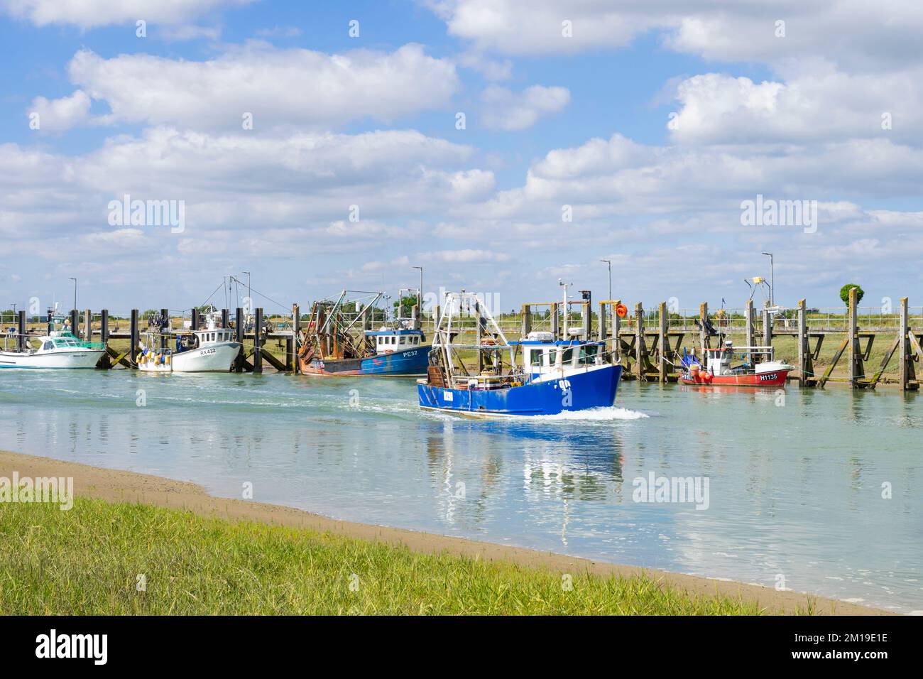 Rye Harbour a local fishing boat on the River Rother is leaving the River Rother to fish in Rye bay River Rother Sussex England UK GB Europe Stock Photo