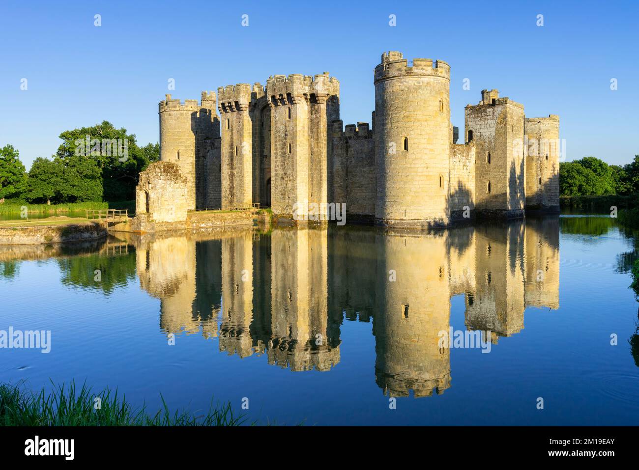 Bodiam Castle with perfect reflection in the moat - Bodiam Castle 14th-century moated castle Robertsbridge Bodiam East Sussex England UK GB Europe Stock Photo