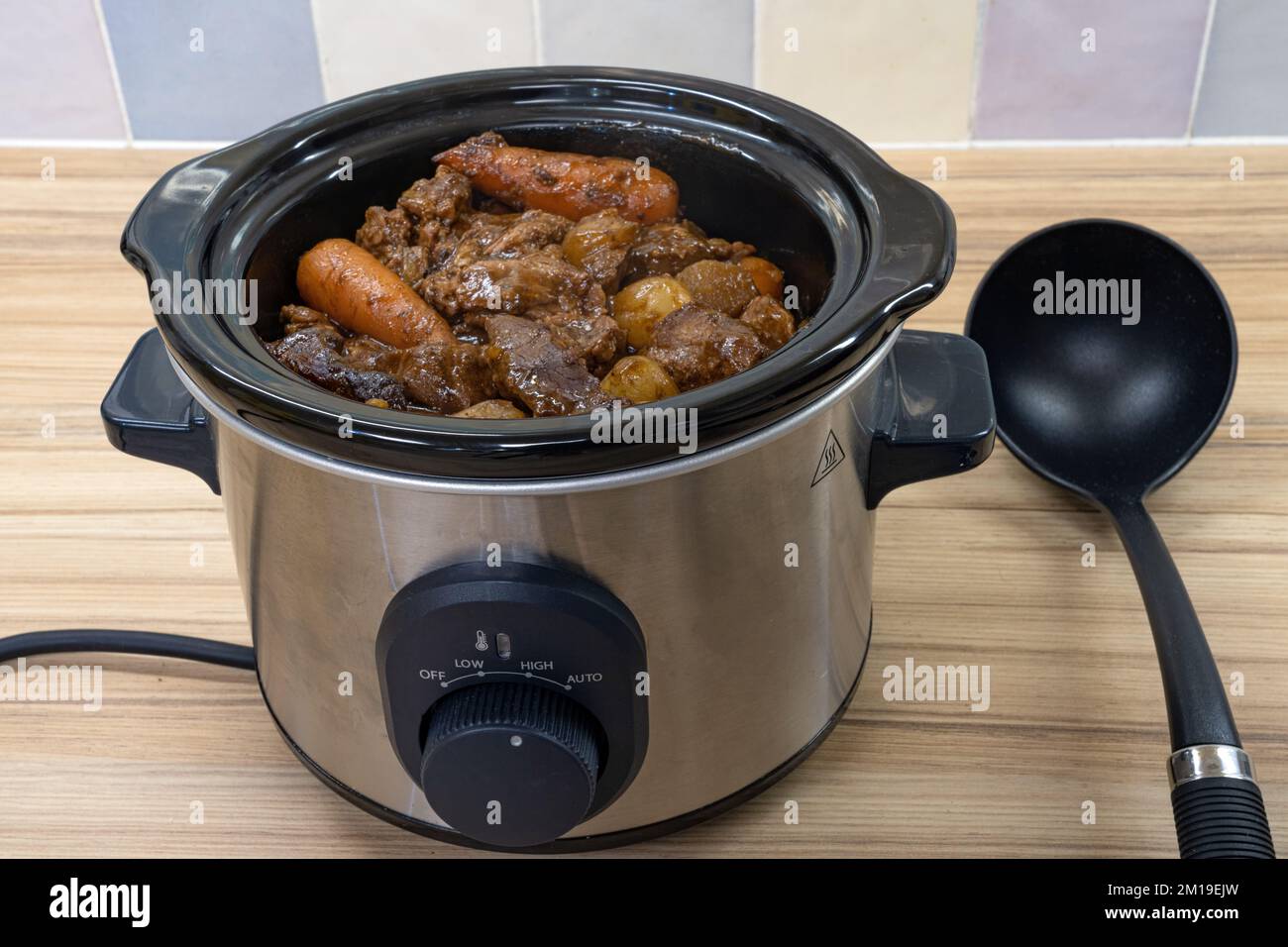 Beef casserole cooked in the slow cooker Stock Photo Alamy