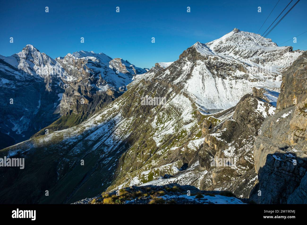 Top of the Schilthorn and view of Breithorn and Bernese Swiss alps, Switzerland Stock Photo