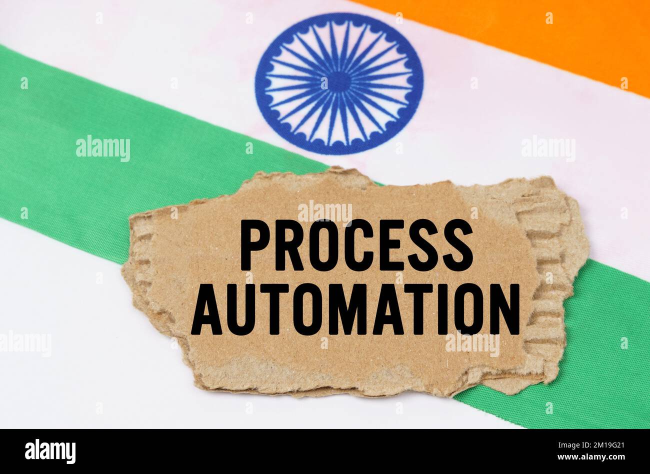 Business and finance concept. The Indian flag has a cardboard box with ...