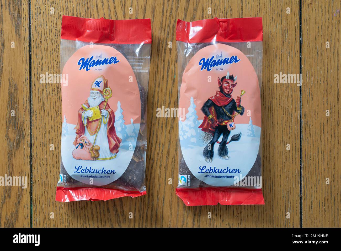 Manner chocolate representations of Saint Nicholas & his companion Knecht Ruprecht - the goat like Krampus - from German folklore. December tradition Stock Photo