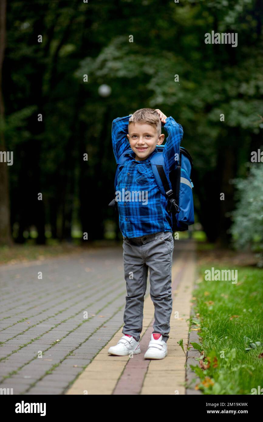 Grade R Portrait Portrait of a first grader with a backpack. The boy goes to school ...