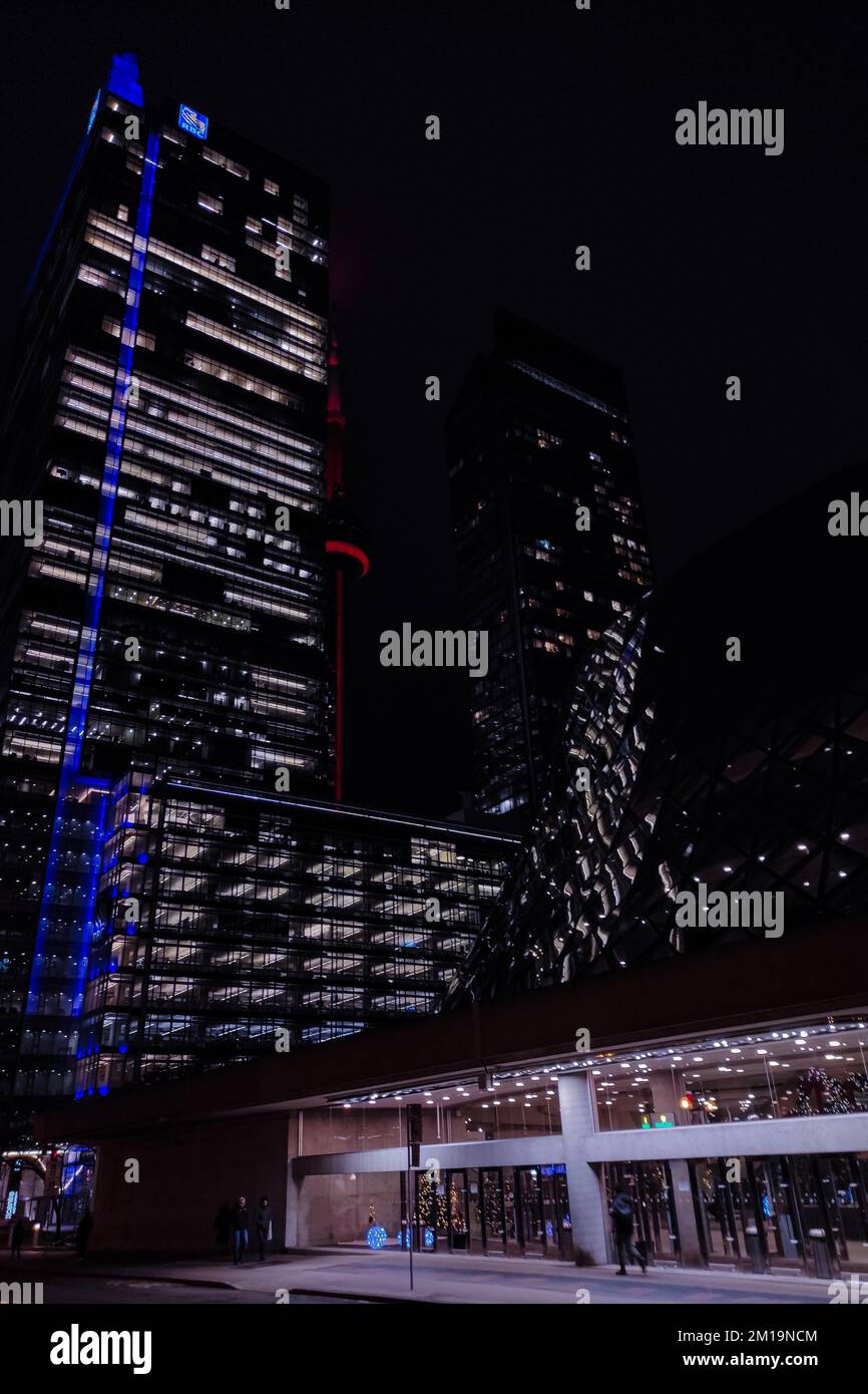 cn tower hiding behind the building toronto canada Stock Photo - Alamy