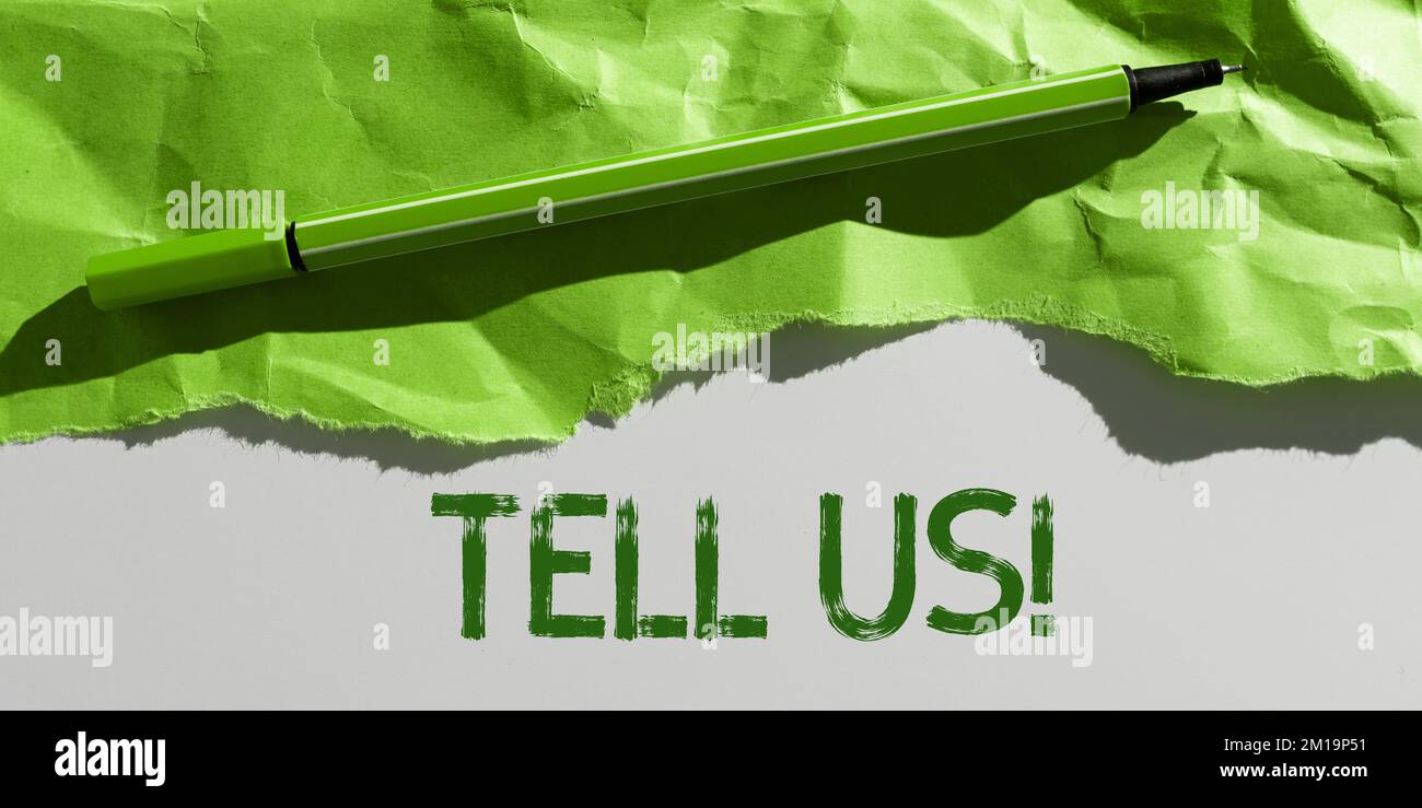 Hand writing sign Tell Us. Word for communicate information to someone in spoken or written