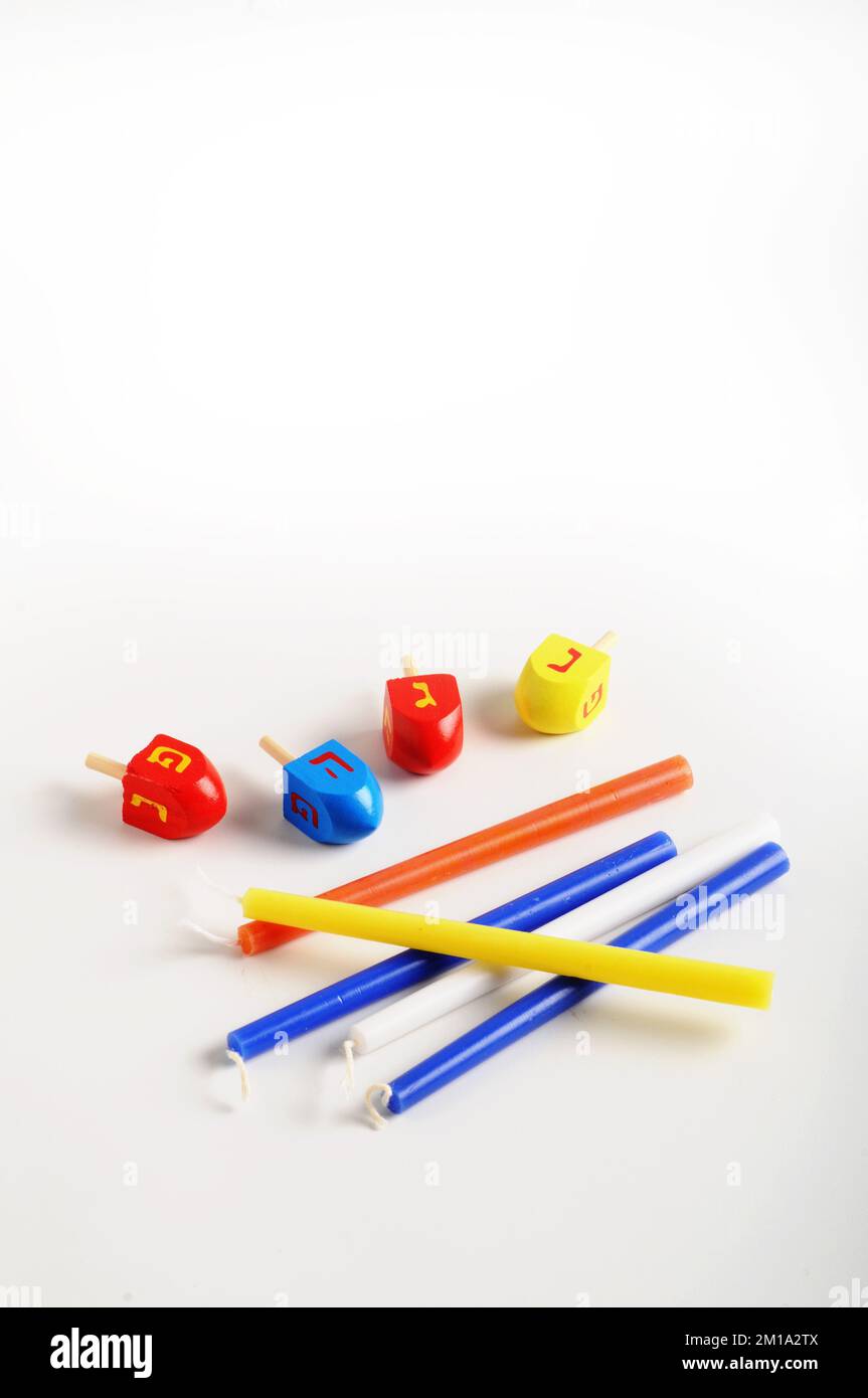 Hanukkah spinning top and candles Traditional Jewish holiday Stock