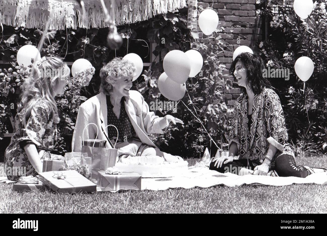 **FILE PHOTO** Georgia Holt, Mother of Cher, Has Passed Away. Actress/singer Cher w. her mother Jackie Jean Crouch aka Georgia Holt taken in 1986 Credit: Ron Wolfson/MediaPunch Stock Photo