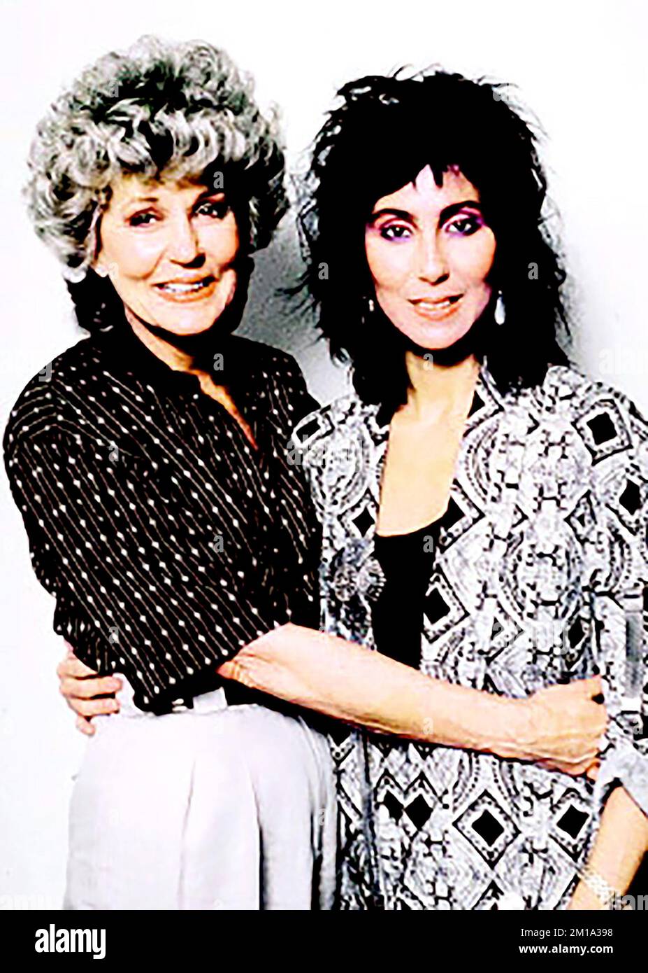 **FILE PHOTO** Georgia Holt, Mother of Cher, Has Passed Away. Actress/singer Cher w. her mother Jackie Jean Crouch aka Georgia Holt taken in 1986 Credit: Ron Wolfson/Rock Negatives/MediaPunch Stock Photo