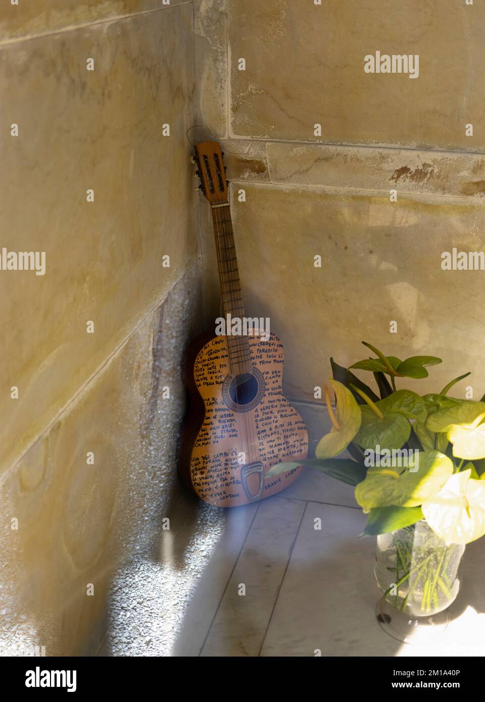 GENOA, ITALY, MAY 5, 2022 - The original guitar of Fabrizio De Andrè, the famous songwriter, inside his tomb in the monumental Cemetry of Genoa, Italy Stock Photo