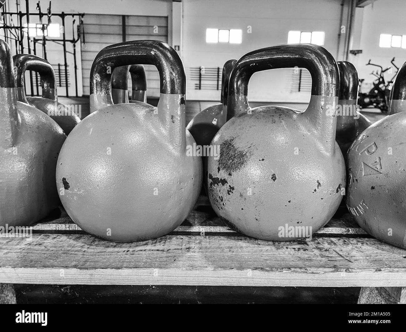 Colorful kettlebells in a gym row Stock Photo Alamy