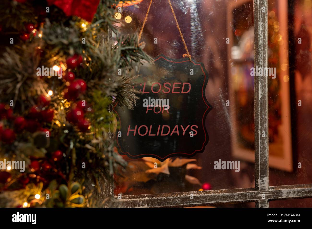 Closed for Christmas holidays in winter time. Shop, store, cafe business closing for vacations