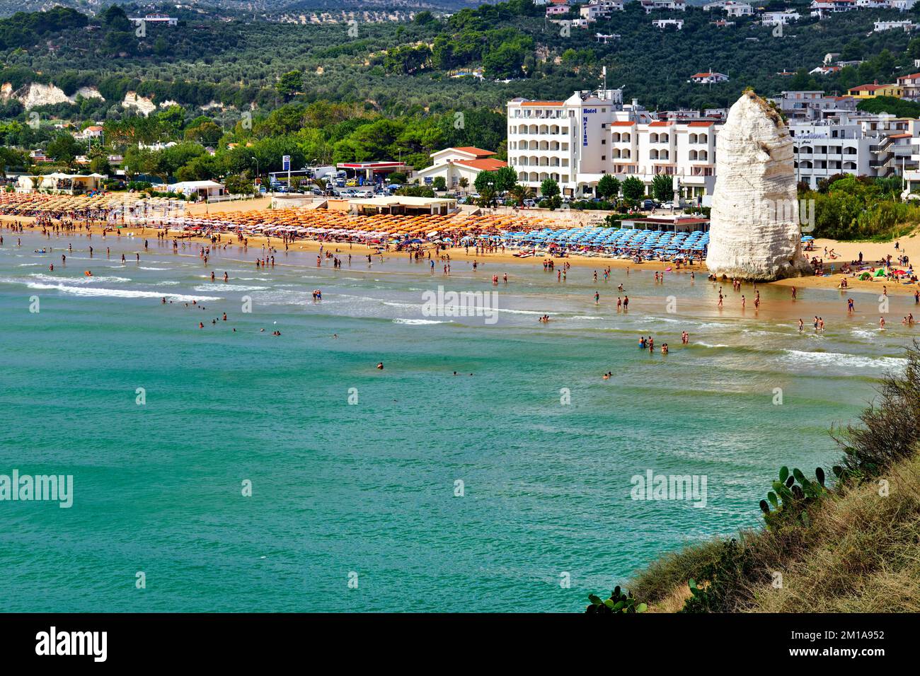 Vieste Gargano. Apulia Puglia Italy. Monolith Pizzomunno and beach Stock Photo
