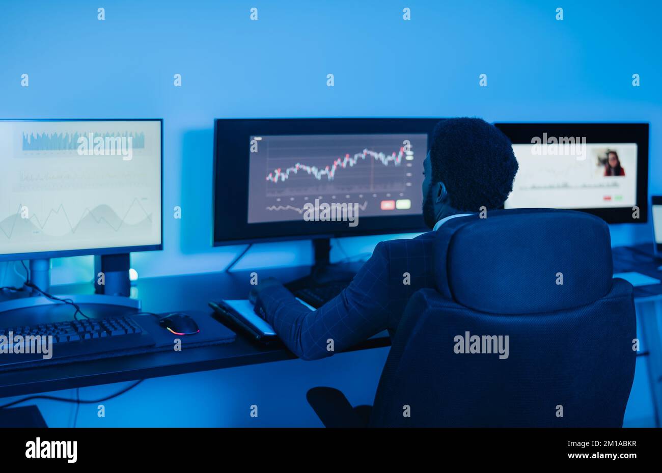 Financial analyst working on stock exchange market in office - Fintech concept Stock Photo
