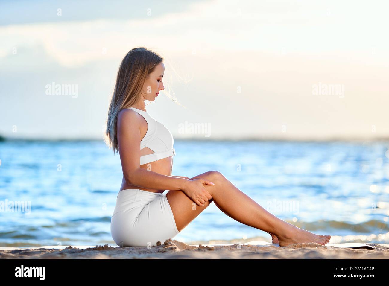 Nice stretching young woman hi-res stock photography and images - Alamy