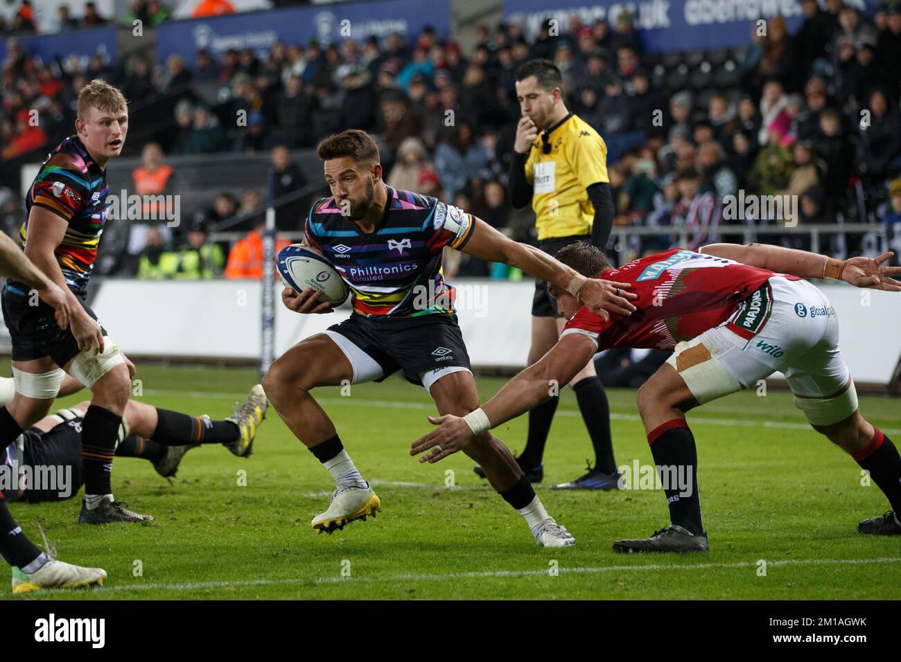 Swansea, UK. 11th Dec, 2022. Rhys Webb of Ospreys attacks close to the Leicester try line during the Ospreys v Leicester Champions Cup rugby match. Credit: Gruffydd Thomas/Alamy Live News Stock Photo