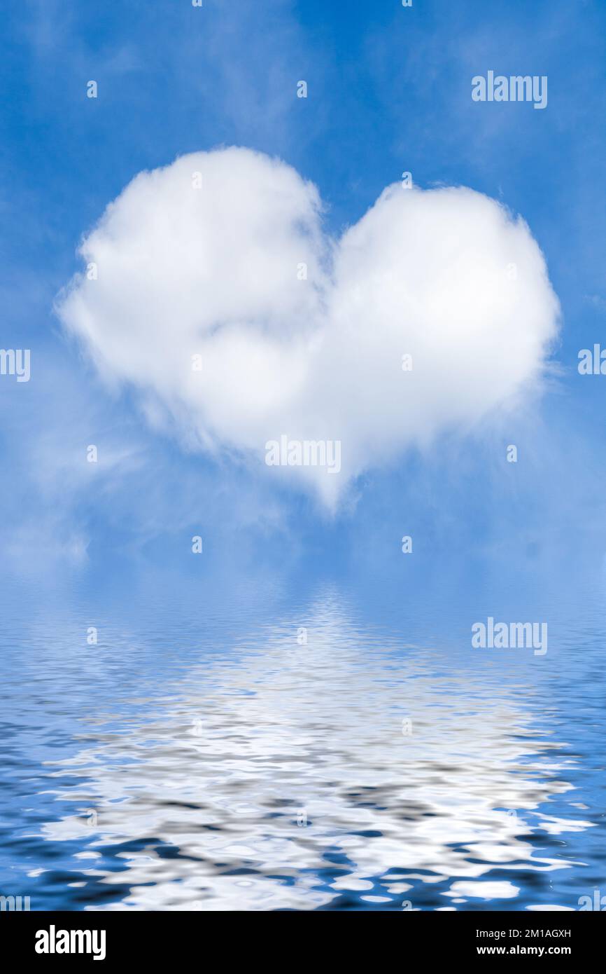 a white cloud in the shape of a heart on a blue sky and with a ...