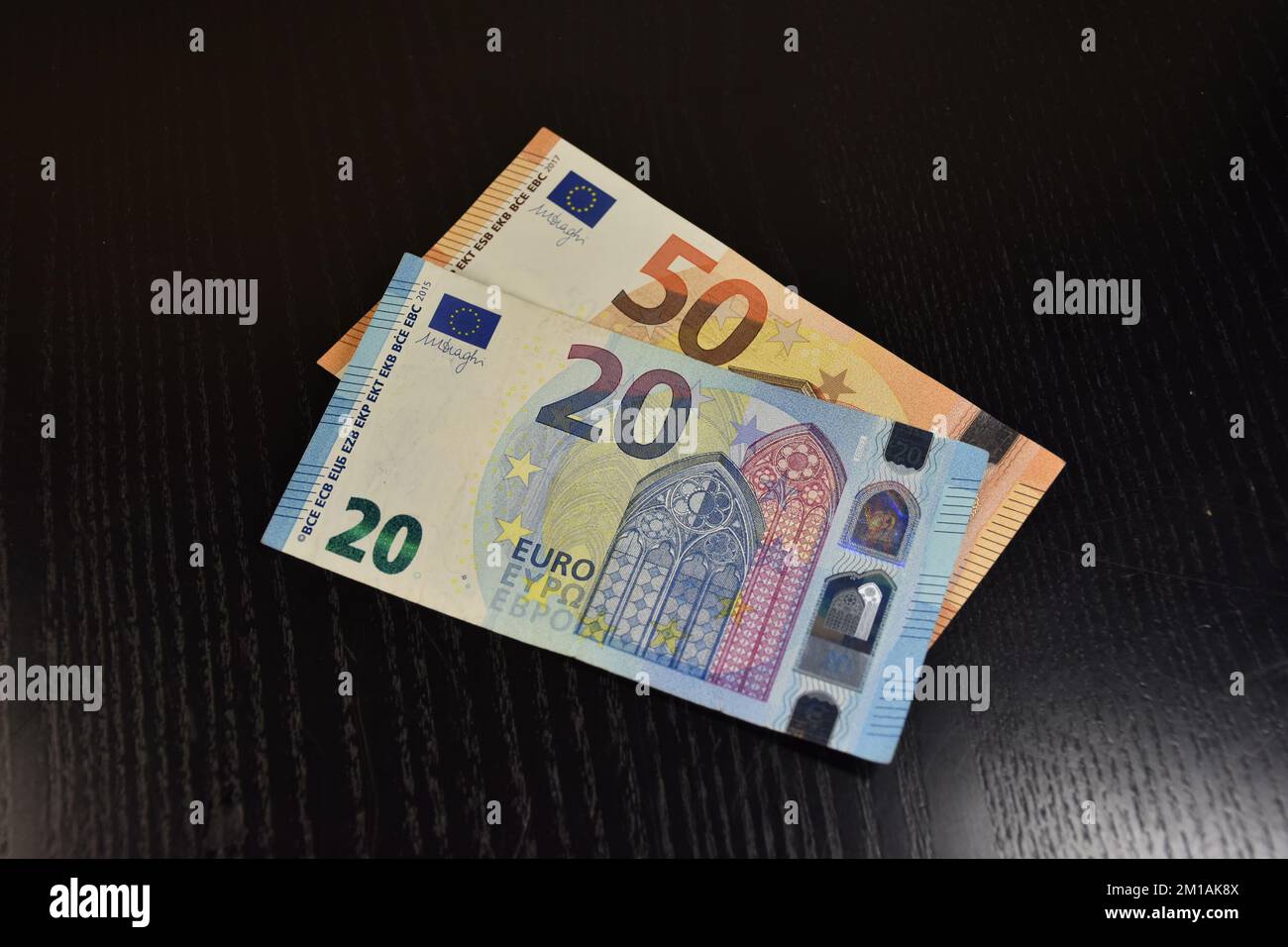 70 Euros Banknotes In A Black Background Stock Photo Alamy