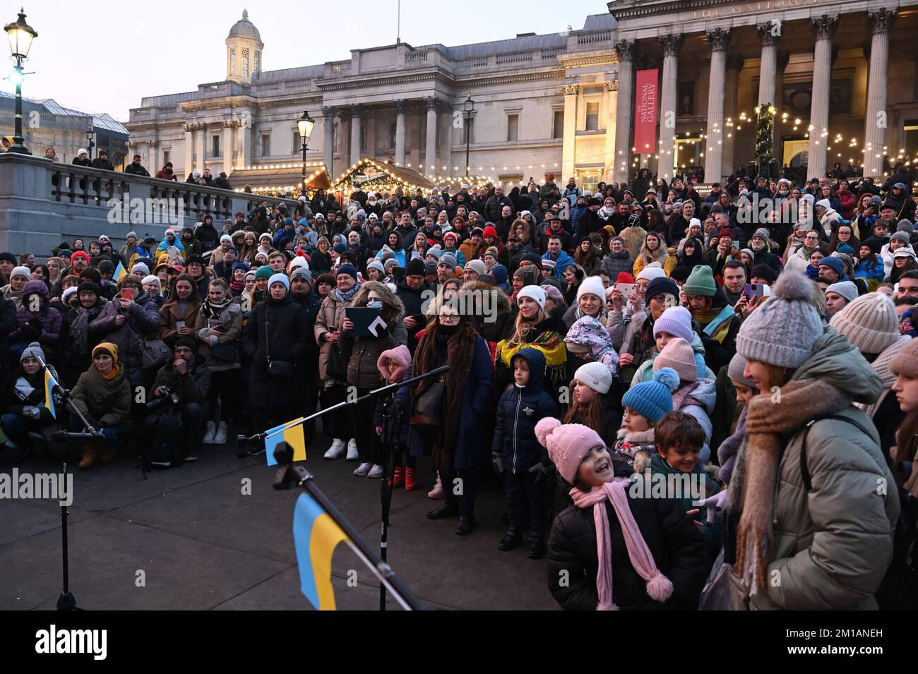 London, United Kingdom. 11th December 2022: The Ukrainian Cathedral Choir for the British Ukrainian Aid - Ukraine Fundraiser with beautiful people singing in Ukrainian and English carols performed under the Christmas tree at Trafalgar Square. Credit: See Li/Picture Capital/Alamy Live News Stock Photo