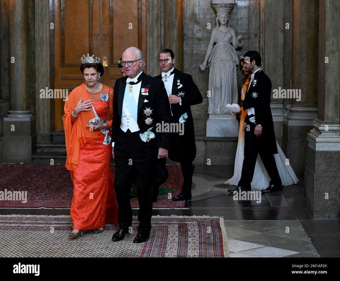 Queen Silvia and King Carl Gustaf attend the King's dinner for the Nobel laureates at the Royal Palace in Stockholm, Sweden, 11 December 2022. Photo: Pontus Lundahl / TT / 10050 Stock Photo