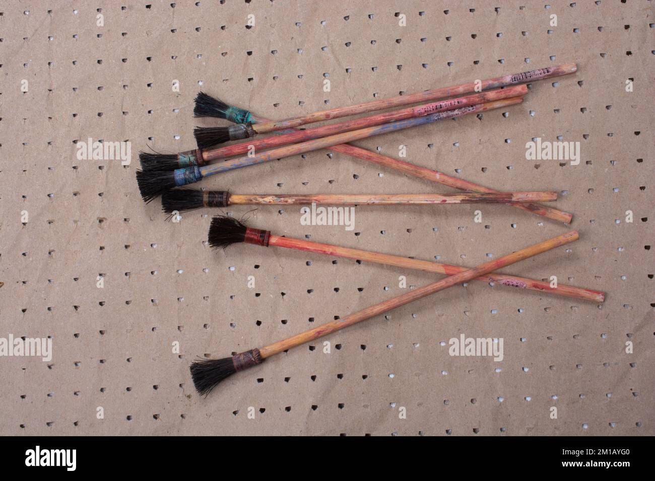 Paint brushes on technique ebru art on paper background Stock Photo