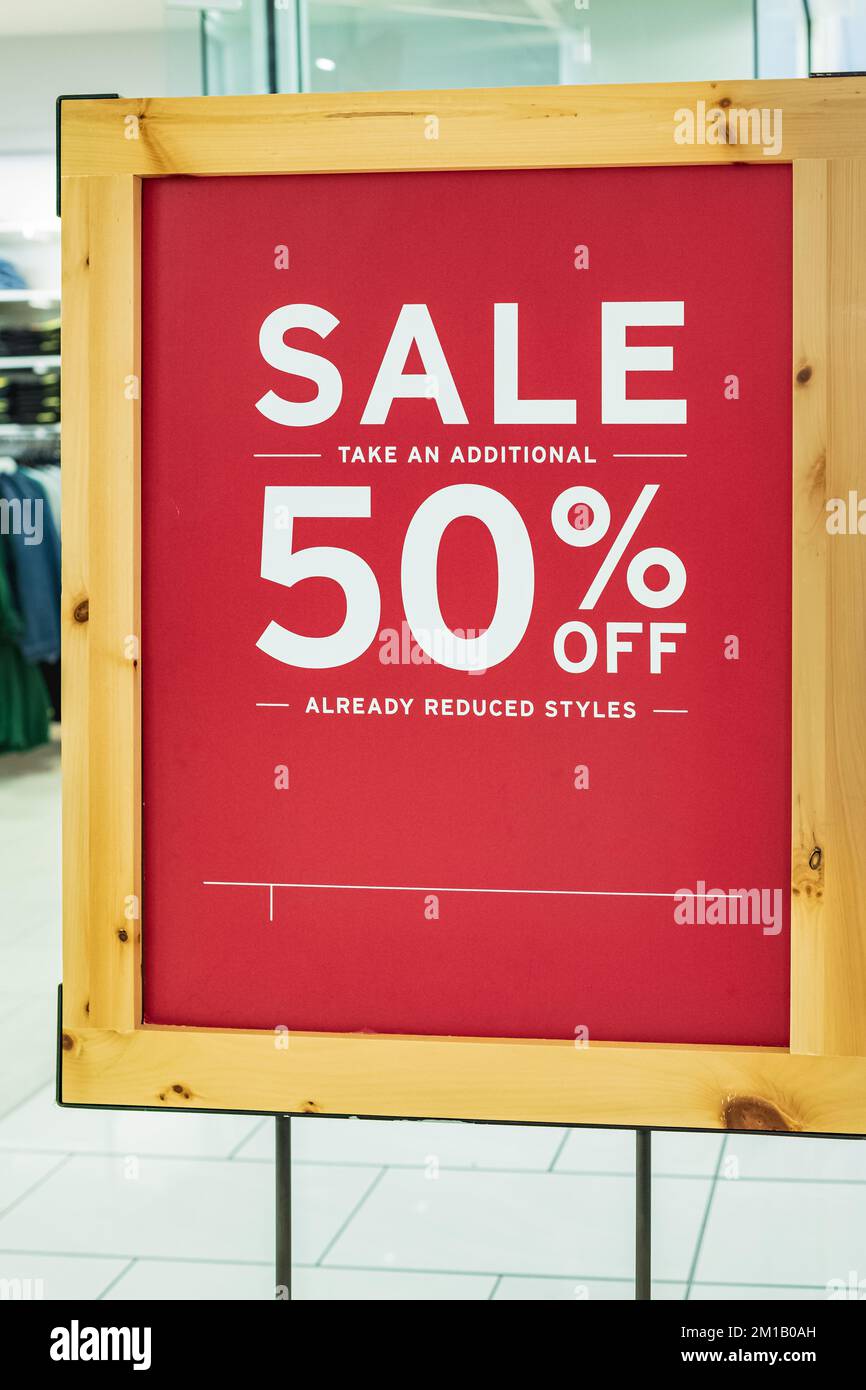 50 percent off in white letters on a red background. Business concept, the text is written - 50 percent OFF SALE. Nobody, selective focus Stock Photo