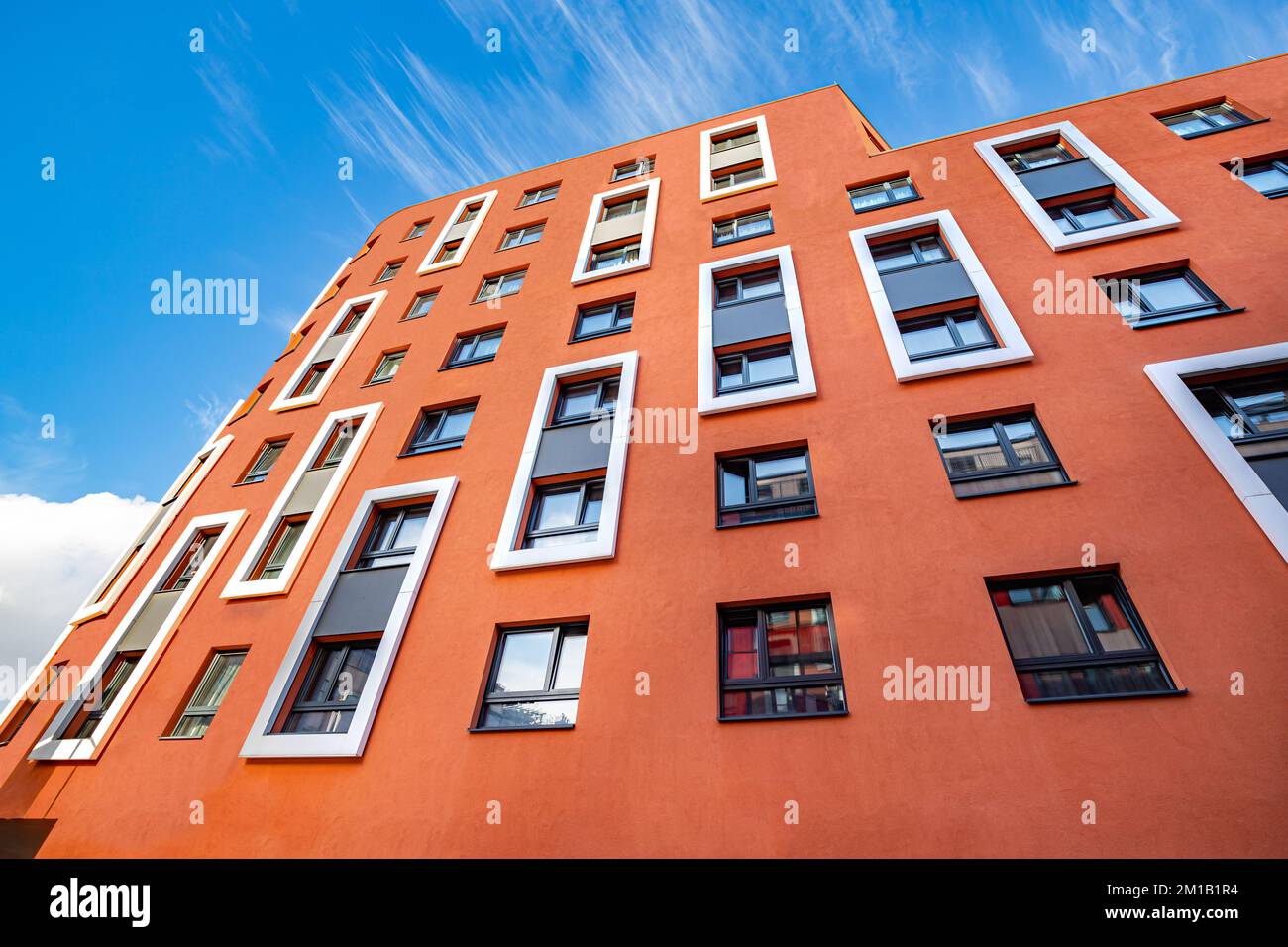 Cityscape with modern buildings in Vienna. Beautiful building in the streets of Vienna, the palace has orange walls with white frames. Stock Photo