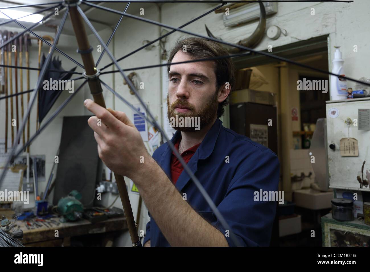 James Smith & Sons making traditional umbrella in their ,in